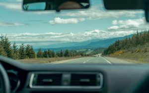 view of mountains through a car windshield